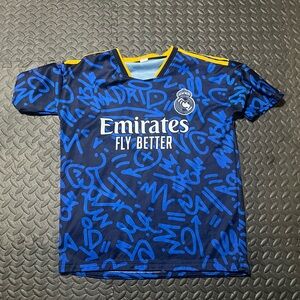 Navy and Bright Blue Graphic Soccer Jersey with Yellow Trim